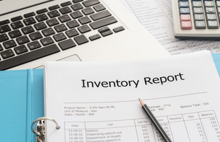spiral notebook with "inventory report" at the top for b-stock inventory